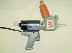 Hand gun for hot butyl